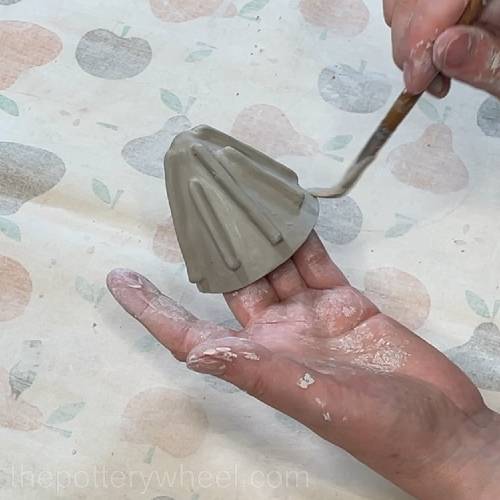 smoothing all the coils on the lemon squeezer cone