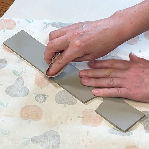 smoothing the edge of the lemon squeezer jug