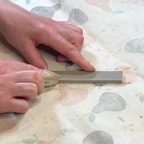 smoothing the edges of the handle