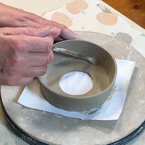 smoothing the join on the inside of the lemon squeezer