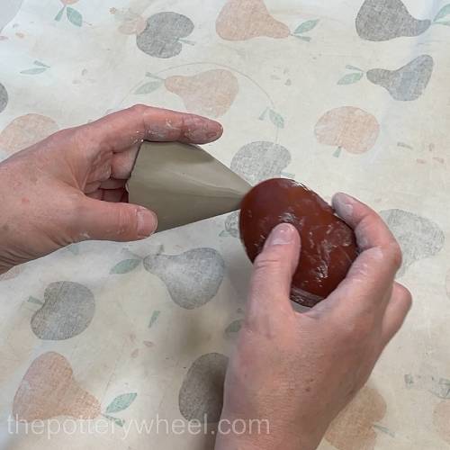 smoothing the seam on the cone